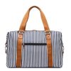 81e1fbda-a1da-42d9-bd39-a55008ecee94 Women's Canvas Striped Travel Bag
