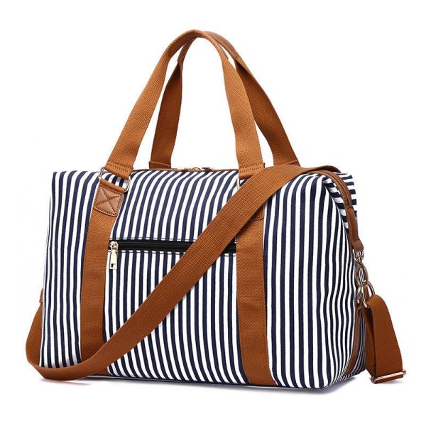 f566fd3e-e80c-483c-a822-74174289923a Women's Canvas Striped Travel Bag